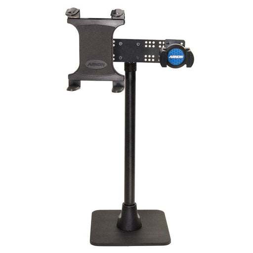 The TW Broadcaster Dual Slim-GripĀ® Tablet and RoadViseĀ® Phone 29-inch Stand Holder is a black adjustable mount with a rectangular base and clamp, designed to securely hold your device upright for live streaming. Arkon branding is featured at the top.