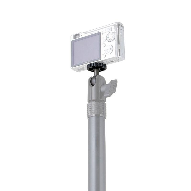 The 20mm Metal Ball to 1/4-20 Camera Bolt Adapter lets you secure a compact digital camera to a silver telescopic pole with an adjustable joint and tightening knob for versatile mounting options.