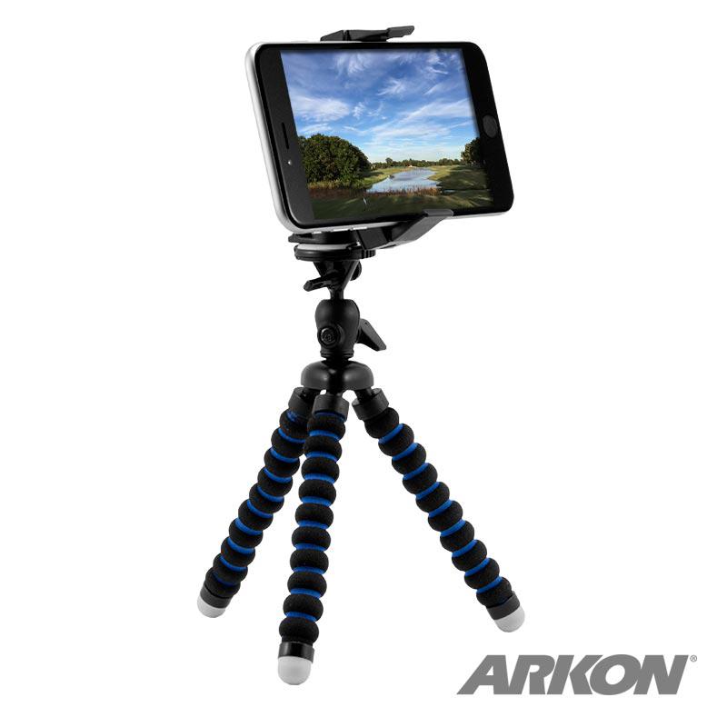 A smartphone is displayed on the 7.5 Mini Adjustable Tripod with Phone Holder, featuring black and blue flexible legs and ideal for content creation. The ARKON logo appears in the lower right corner as it shows a landscape photo.