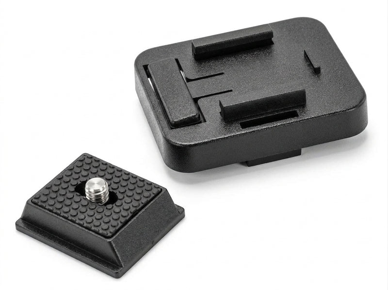 Two black Arkon Mounts Quick Release Camera Adapter Converter plates—one shown upright with a textured surface and silver screw, the other lying flat to display smooth slots and attachment mechanisms—ideal for use with a Quick Release Camera Adapter or AMPS adapter, and compatible with 22mm ball socket mounting systems.