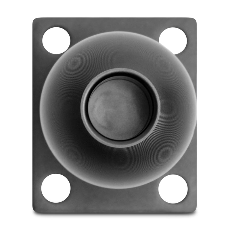 A close-up of the XMS 38mm AMPS Adapter Plate: a black, circular industrial control button on a rectangular base with an AMPS mounting pattern, four screw holes, and a textured concentric ring for enhanced grip.
