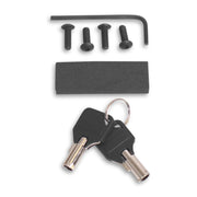Key set with keychain, screws, and a block on a white background