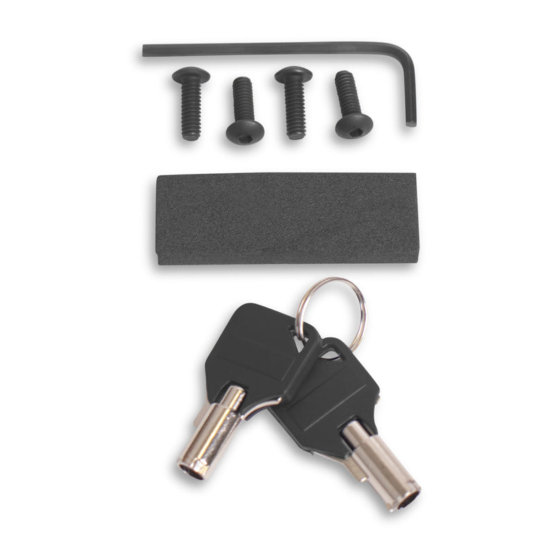 Key set with keychain, screws, and a block on a white background