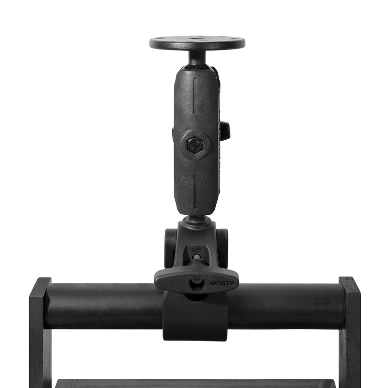 The RoadVise® Clamp Mount with Metal Circular Mount Plate, a black metal clamp mount with an adjustable arm, is firmly attached to a horizontal bar and photographed against a white background.