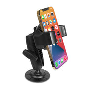 A gold smartphone shows its home screen while secured in the RoadVise® Ultra Holder with Adhesive Mount, a black adjustable holder ideal as a car phone mount or versatile desk accessory.