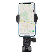 A smartphone is mounted vertically in the black RoadVise® Holder with Double Socket Arm and Drill-Base Mount, displaying a map app. The secure drill-base mount attaches to a flat surface for sturdy phone positioning.