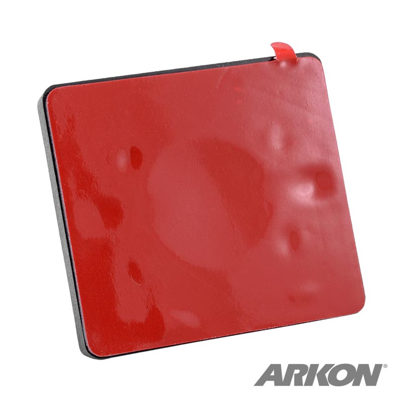 A square 3M VHB adhesive Security Plate with a slot for use with cables to lock down laptops, tablets, or monitors sits on a white background. The Arkon logo is visible in the bottom right corner.