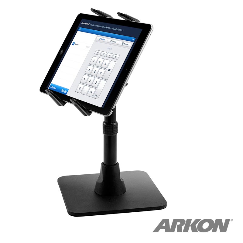 A Slim-Grip® Tablet Holder Desk Stand in black holds a tablet displaying a numeric keypad, with the Arkon logo visible in the bottom right corner.