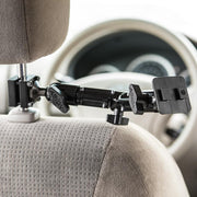 The Heavy-Duty Headrest Mounting Pedestal with Multi-Angle 8 Arm securely holds your tablet to a car’s headrest, extending forward with the dashboard and steering wheel visible in the background.