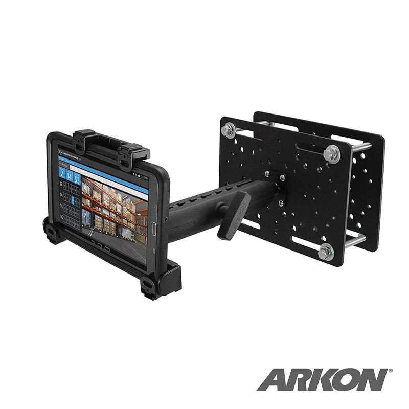 The LockVise™ Locking Forklift Overhead Guard Tablet Mount with 8.5 Metal Shaft is shown on a black metal bracket with wall plate, displaying a warehouse inventory screen—ideal for secure warehouse or forklift tablet mounting.