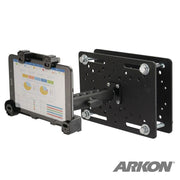 A tablet displaying charts is mounted on the LockVise™ Locking Forklift Overhead Guard Tablet Mount with a 6 metal shaft, ideal for warehouse use. The mount features a black adjustable design and shows the ARKON logo in the bottom right corner.