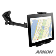 An iPad is displayed on the ARKON Long Arm Windshield Suction Tablet Mount, attached to a flat surface and showing a city map. The ARKON brand logo is visible in the lower right corner.