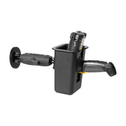 A Magnetic Mount with Barcode Scanner Holster Holder secures a black pistol grip barcode scanner in a warehouse, attached to the wall with an adjustable arm.