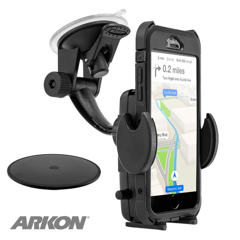 A black Mega Grip™ Phone Holder with Windshield and Dash Car Mount secures a smartphone displaying GPS; it features a suction cup, adjustable holder, circular adhesive pad, and the Arkon logo in the corner.