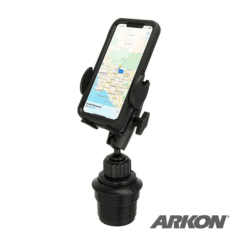 The Mega Grip™ Universal Car Cup Holder Phone Mount holds a smartphone with maps displayed, providing hands-free navigation. It fits securely in your vehicle’s cup holder; the Arkon logo appears in the bottom right corner.