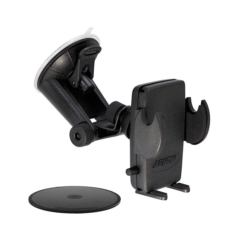 The Mega Grip™ Windshield Phone Mount is a black dash phone holder with an adjustable suction mount and padded grip arms, shown beside a round adhesive dashboard pad for hands-free use in vehicles.