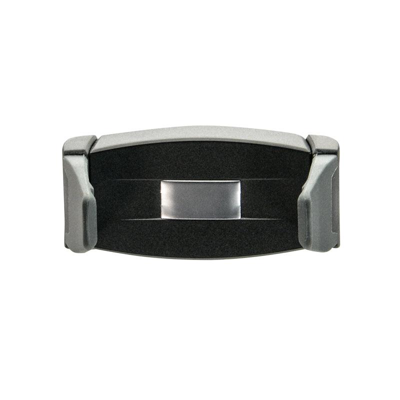 A close-up of the Mobile Grip 3 Universal Smartphone Holder, featuring a black and gray plastic spring-loaded design with a metallic rectangular center, displayed against a white background.