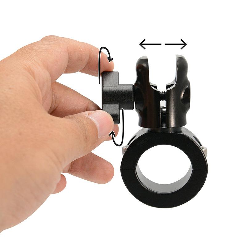 A hand adjusts the Premium Aluminum Motorcycle Handlebar Mount Pedestal (20mm ball compatible), turning a knob for rotation and horizontal adjustment—ideal as a sturdy motorcycle handlebar mount.