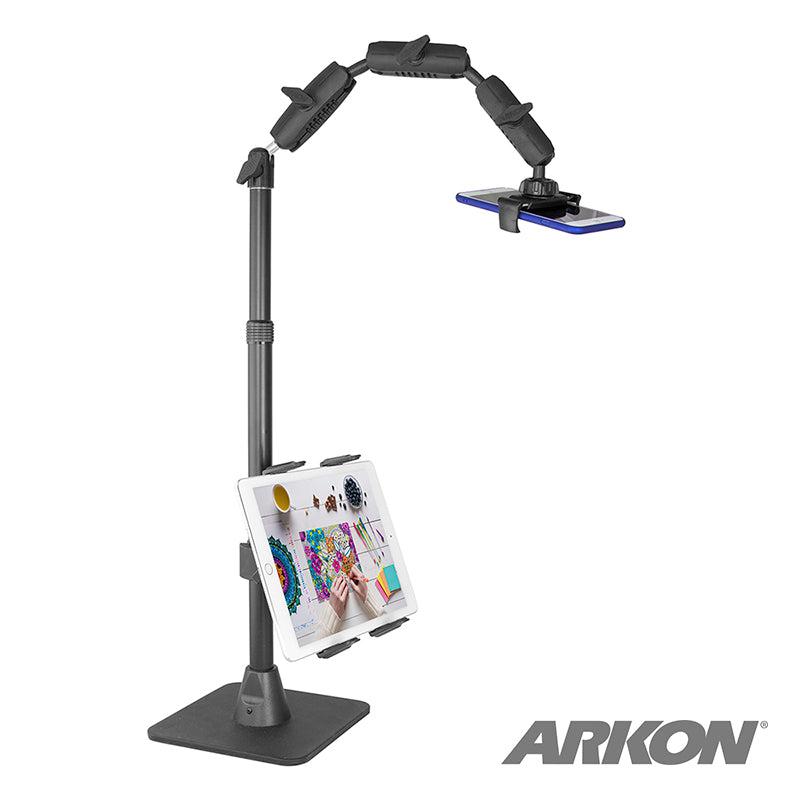 The Remarkable Creator™ Pro+Plus Mount w/Ring Light holds a smartphone overhead and a tablet mid-level for content creation, both with vivid screens. The ARKON logo is at the bottom right.