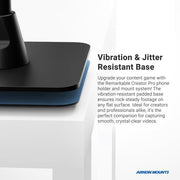 A close-up of the Remarkable Creator™ Pro+Plus Mount w/Ring Light—its black, blue, and gray base on a white table showcases jitter-resistant stability for smooth phone or camera footage, ideal for content creation within your video bundle.