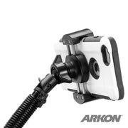A close-up of the RoadVise® Phone Holder with 15 Gooseneck and Seat Rail Mount securely gripping a smartphone in a black and white case, with the Arkon logo in the bottom right corner.
