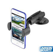 A smartphone is secured in a black RoadVise® Phone Holder with Adhesive Car or Truck Mount. The phone displays a website, and the Arkon Mounts logo is visible in the bottom right corner.