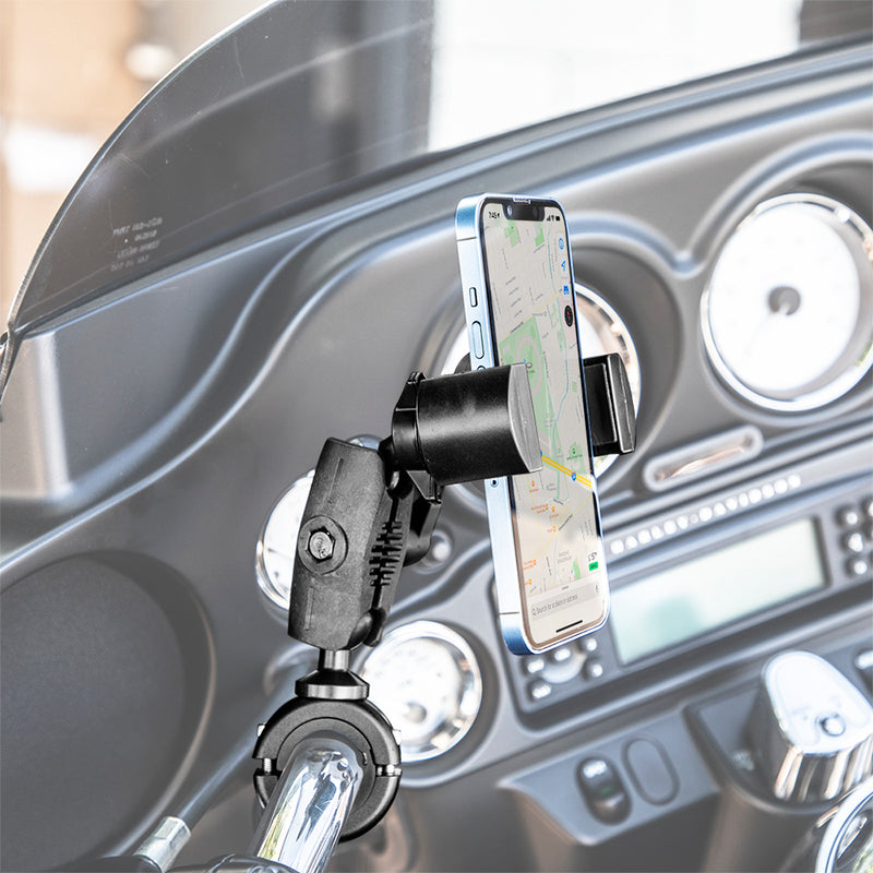 A RoadVise® XL Phone and Midsize Tablet Holder with Handlebar Collar Mount and 2.75 Shaft secures a smartphone showing navigation on a motorcycle, with the dashboard and gauges visible in the background.