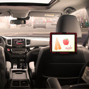 A tablet mounted on a LockVise™ Metal Locking Car Headrest Tablet Mount shows the letter A and an apple image with apple. The parked car’s backseat view includes the dashboard and sunroof.