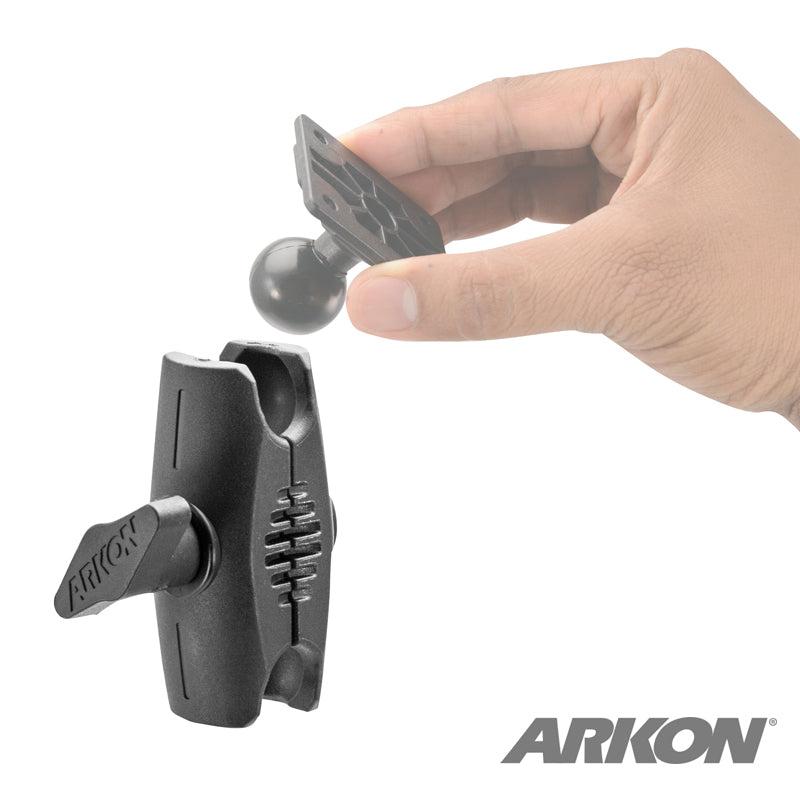 A hand holds a Robust™ Series 2.75 inch Composite Mount Shaft - 25mm Ball Compatible above a black adjustable shaft with side tightening knob. The Arkon logo is visible in the bottom right corner.