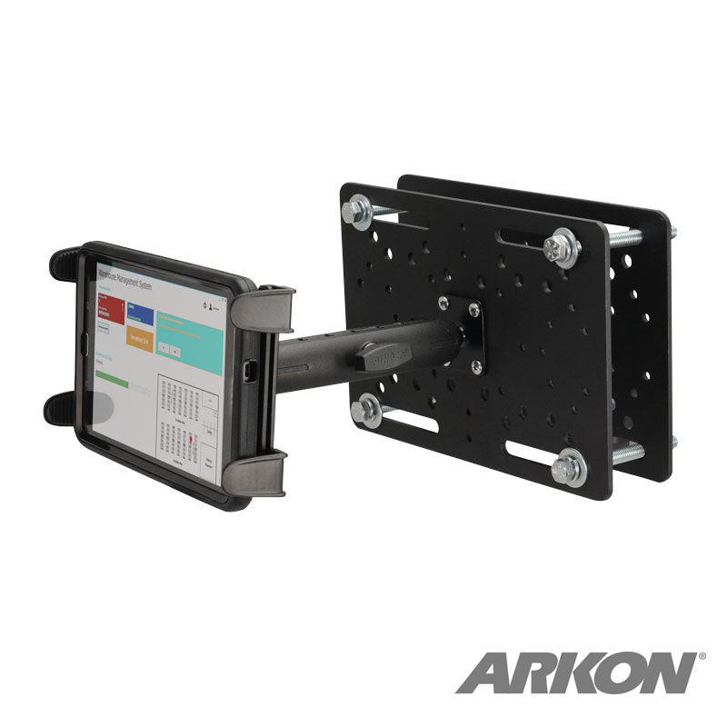 A Slim-Grip® Tablet Holder with Forklift Overhead Guard Mount and 6 Metal Shaft securely holds a tablet in landscape mode, featuring adjustable arms and a perforated backplate with bolts for solid mounting.