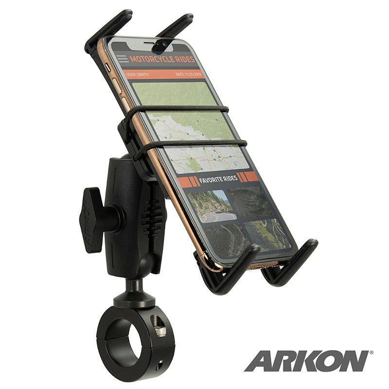 A Slim-Grip® Ultra Phone Holder with Motorcycle Handlebar Mount and 2.75 Shaft in black secures a smartphone on the handlebars, displaying navigation. Adjustable arms and a rubber strap grip the phone, with the Arkon logo visible in the corner.