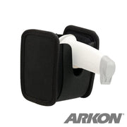 The Universal Barcode Scanner Holder secures a white barcode scanner upright with its black fabric design. Featuring 4-hole AMPS compatibility for flexible mounting, the ARKON logo appears in the bottom right corner.