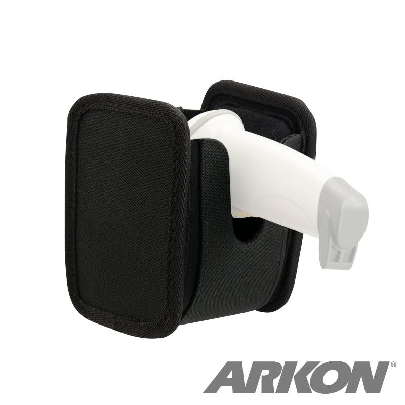 The Universal Barcode Scanner Holder secures a white barcode scanner upright with its black fabric design. Featuring 4-hole AMPS compatibility for flexible mounting, the ARKON logo appears in the bottom right corner.