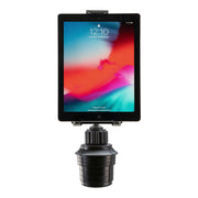 A Universal Push-Button Tablet Cup Holder Mount in black is attached to an automotive gear shift knob, securely holding a tablet with a colorful screen showing the time 12:10.