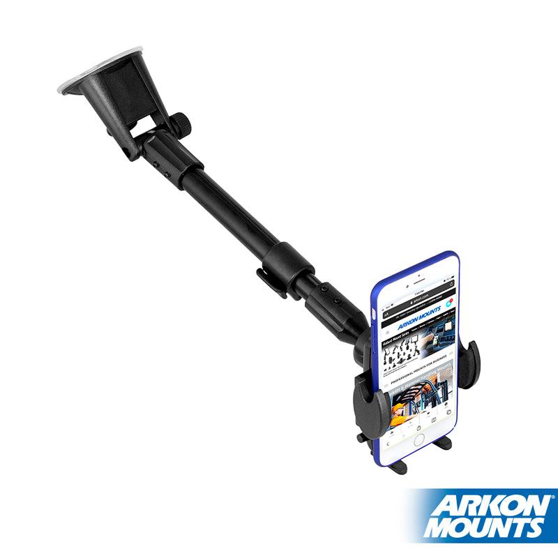 The Windshield Suction Car Mega Grip™ Phone Mount is a black adjustable phone holder with an extendable arm and suction cup, securely holding a smartphone displaying a website. The “ARKON MOUNTS” logo appears in the lower right corner.